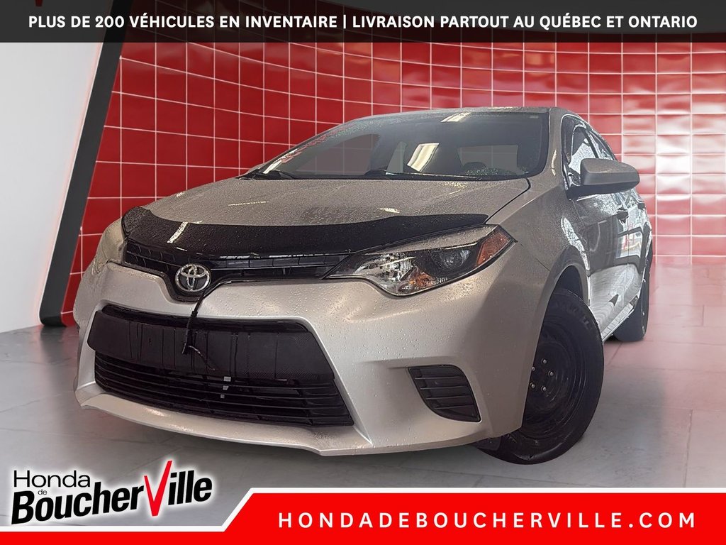 2016 Toyota Corolla LE in Terrebonne, Quebec - 1 - w1024h768px
