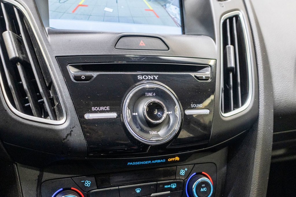 2016 Ford Focus Titanium in Charlemagne, Quebec - 16 - w1024h768px