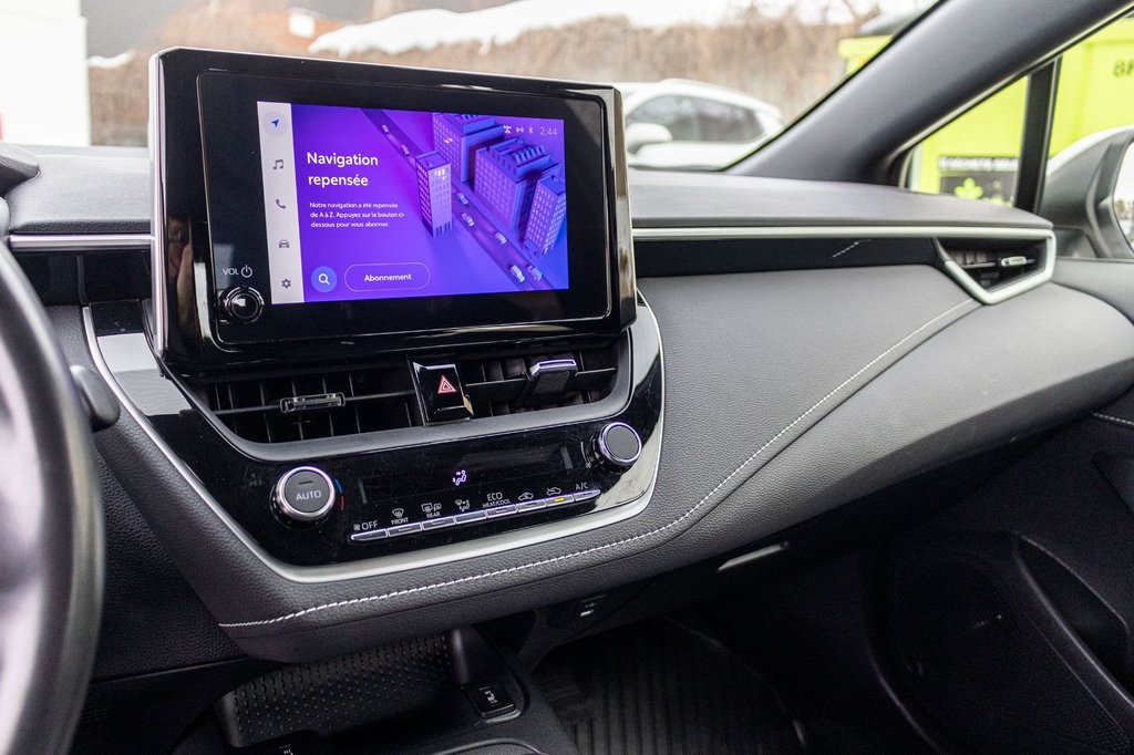2023 Toyota Corolla Hatchback BLANC in Charlemagne, Quebec - 14 - w1024h768px