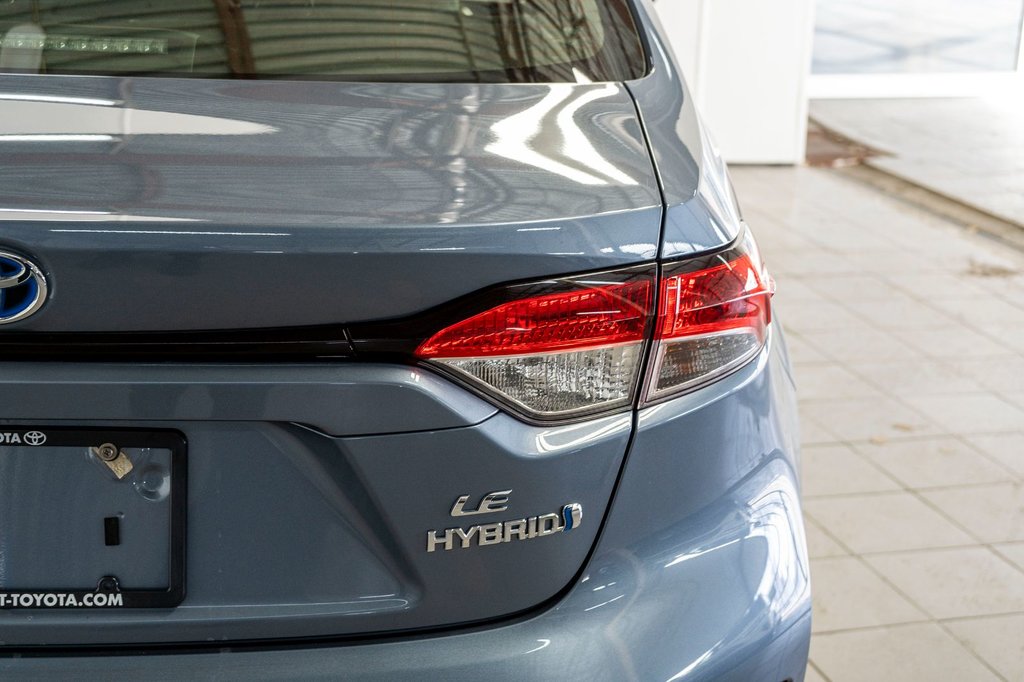 2023 Toyota COROLLA HYBRIDE LE CAMÉRA+CARPLAY+ANDROID AUTO in Charlemagne, Quebec - 25 - w1024h768px