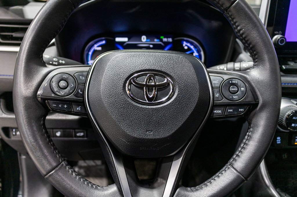 2023 Toyota RAV4 Hybride SE **JAMAIS ACCIDENTÉ+TOIT+CARPLAY+CAMÉRA+MAG** in Charlemagne, Quebec - 9 - w1024h768px