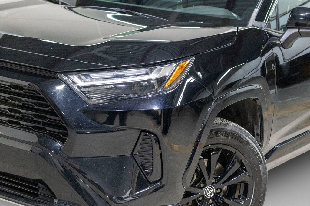 2023 Toyota RAV4 Hybride SE **JAMAIS ACCIDENTÉ+TOIT+CARPLAY+CAMÉRA+MAG** in Charlemagne, Quebec - 35 - w1024h768px