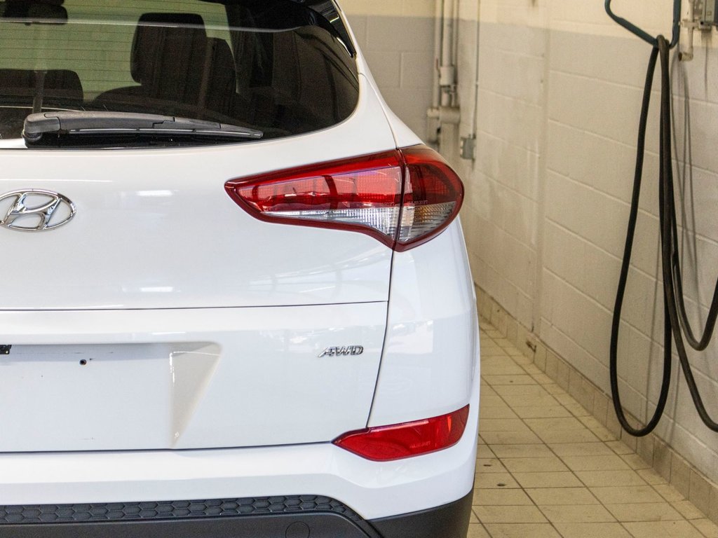 Hyundai TUCSON SE SE, AWD, TOIT, CUIR, BANCS CHAUFF, CAMERA REC 2017 à Saint-Jérôme, Québec - 30 - w1024h768px