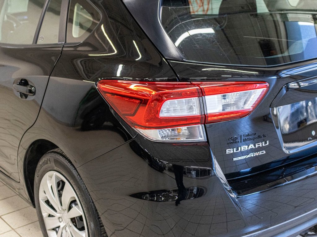 2019 Subaru IMPREZA 5P COMMODITÉ CONVENIENCE, MANUELLE, CARPLAY, CAMERA RECUL in Saint-Jérôme, Quebec - 30 - w1024h768px