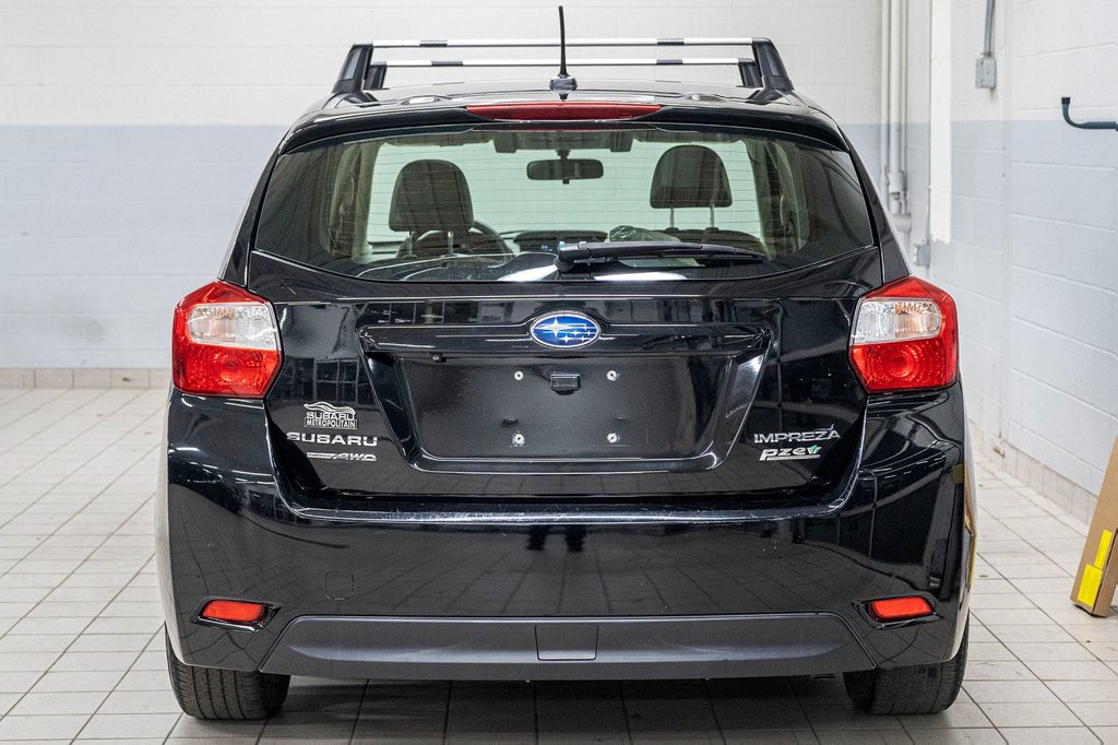 Impreza LIMITED, EYESIGHT, CUIR, TOIT, BANCS CHAUFF, CAM 2015 à Charlemagne, Québec - 5 - w1024h768px