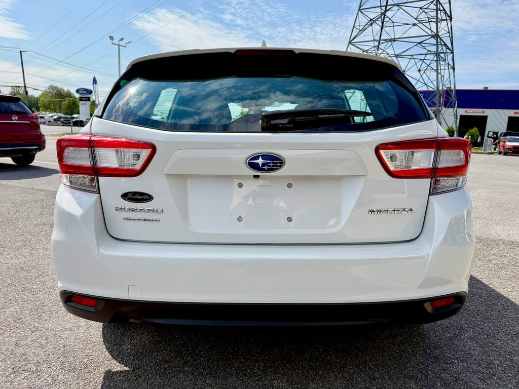 2019 Subaru Impreza Touring in Notre-Dame-des-Prairies, Quebec - 11 - w1024h768px
