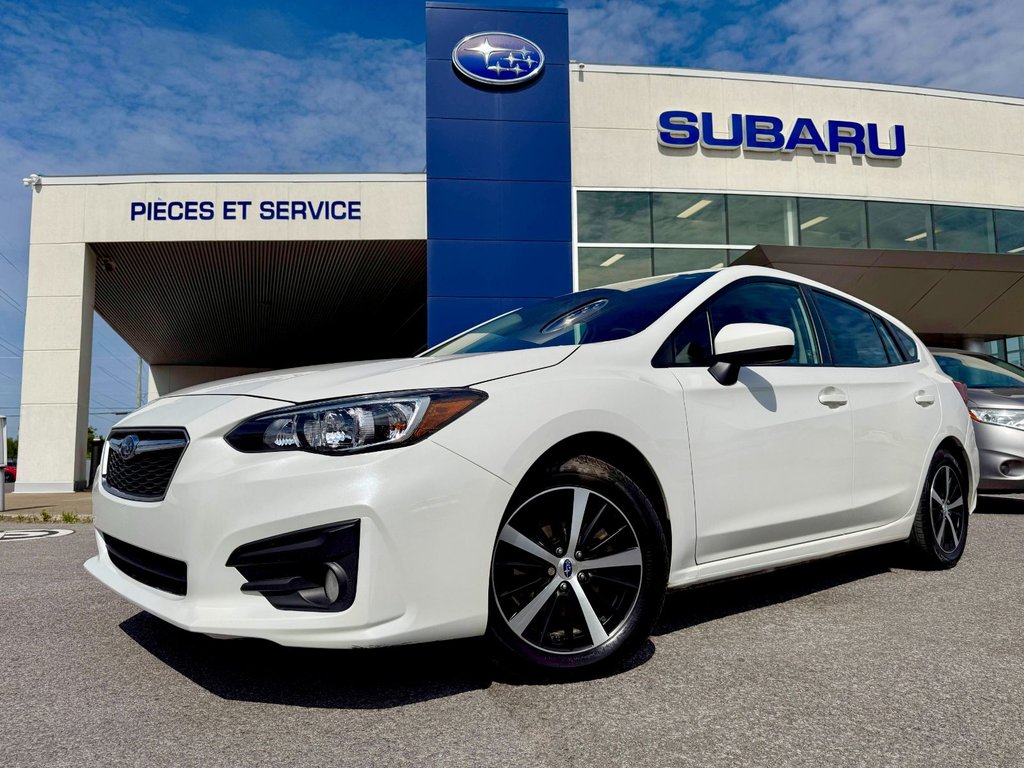 2019 Subaru Impreza Touring in Notre-Dame-des-Prairies, Quebec - 1 - w1024h768px