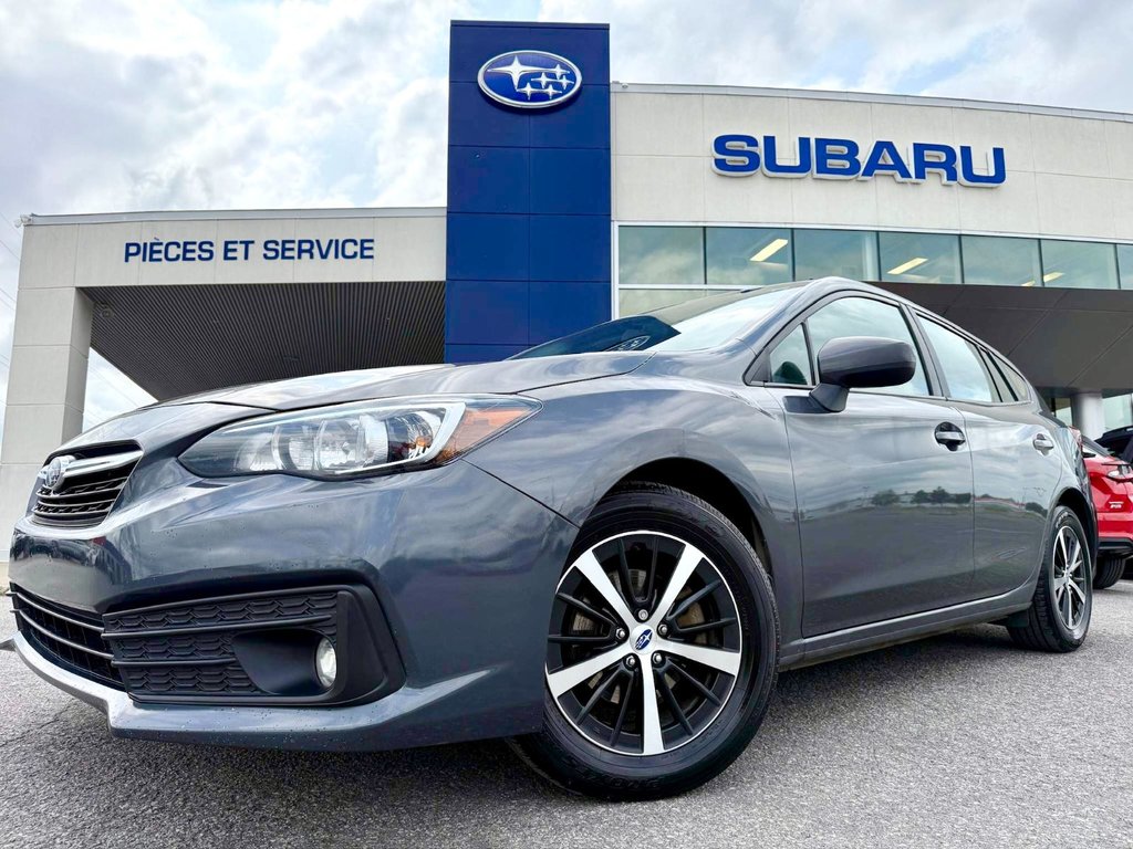 2022 Subaru Impreza Touring in Notre-Dame-des-Prairies, Quebec - 1 - w1024h768px