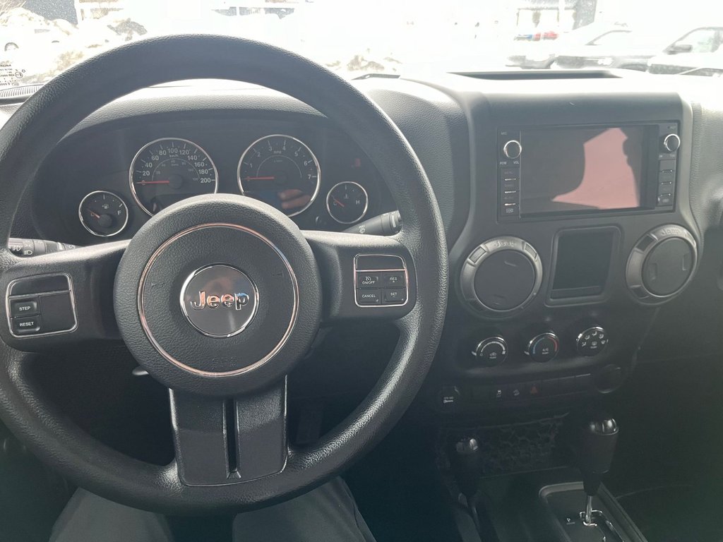2016 Jeep Wrangler Sport in Saint-Georges, Quebec - 13 - w1024h768px