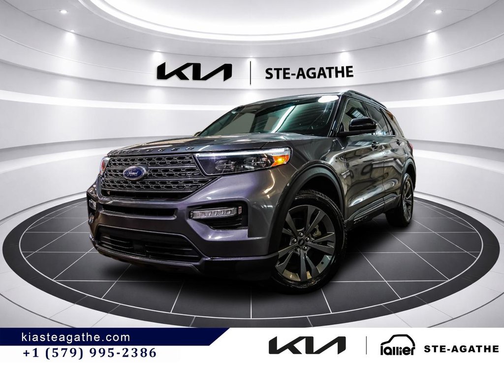 Ford Explorer XLT AWD** TOIT PANORAMIQUE**VOLANT CHAUFFANT**SIÈGES ÉLECTRIQUES**6 PASSAGERS** HAYON ÉLECTRIQUE** 2023 à Montréal, Québec - 1 - w1024h768px
