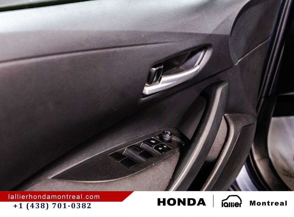 2021 Toyota Corolla L in Montréal, Quebec - 12 - w1024h768px