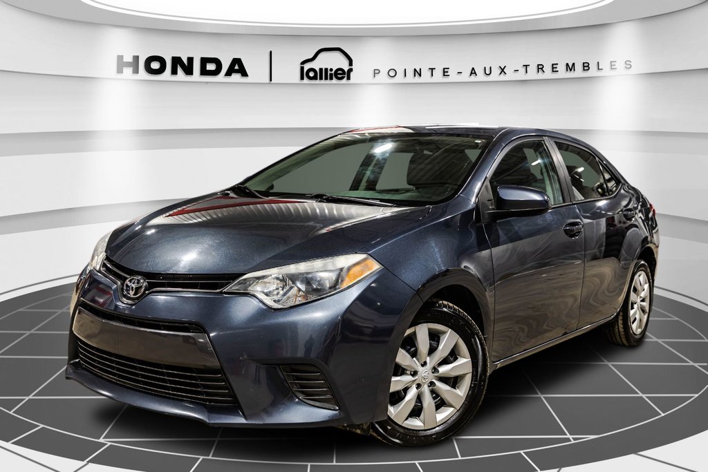 2016 Toyota Corolla LE in Montréal, Quebec - 1 - w1024h768px