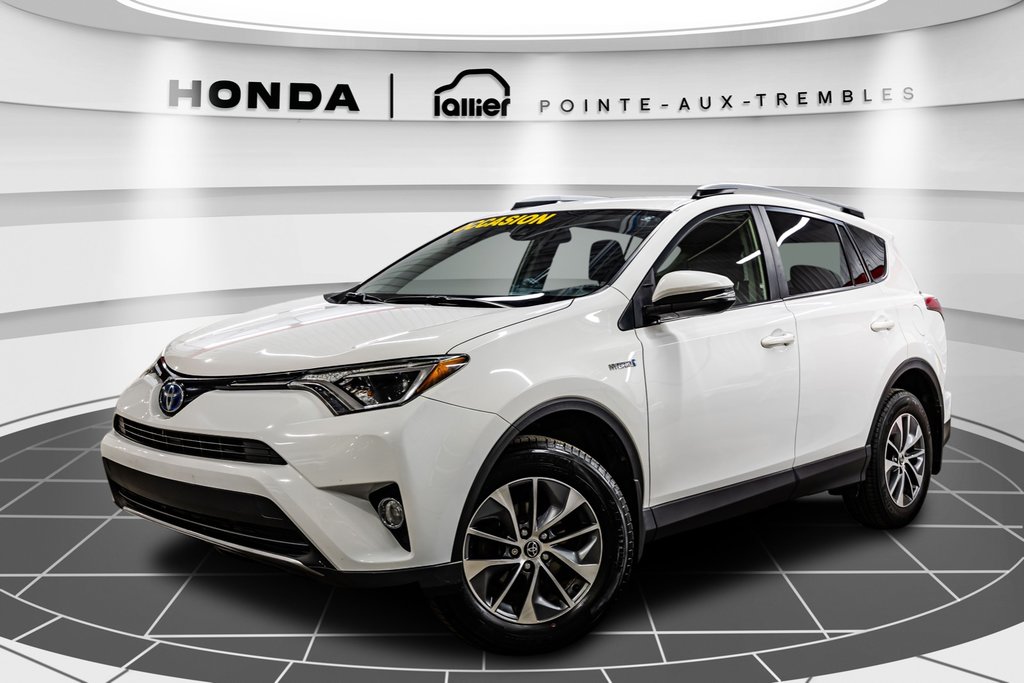 2018  RAV4 Hybrid LE+ 1 PORPRIO in , Quebec - 1 - w1024h768px