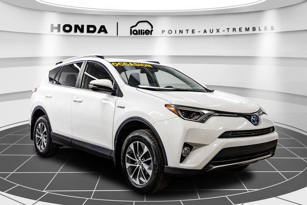 2018  RAV4 Hybrid LE+ 1 PORPRIO in , Quebec - 9 - w1024h768px