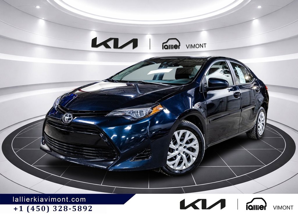 2018 Toyota Corolla LE in Montréal, Quebec - 1 - w1024h768px