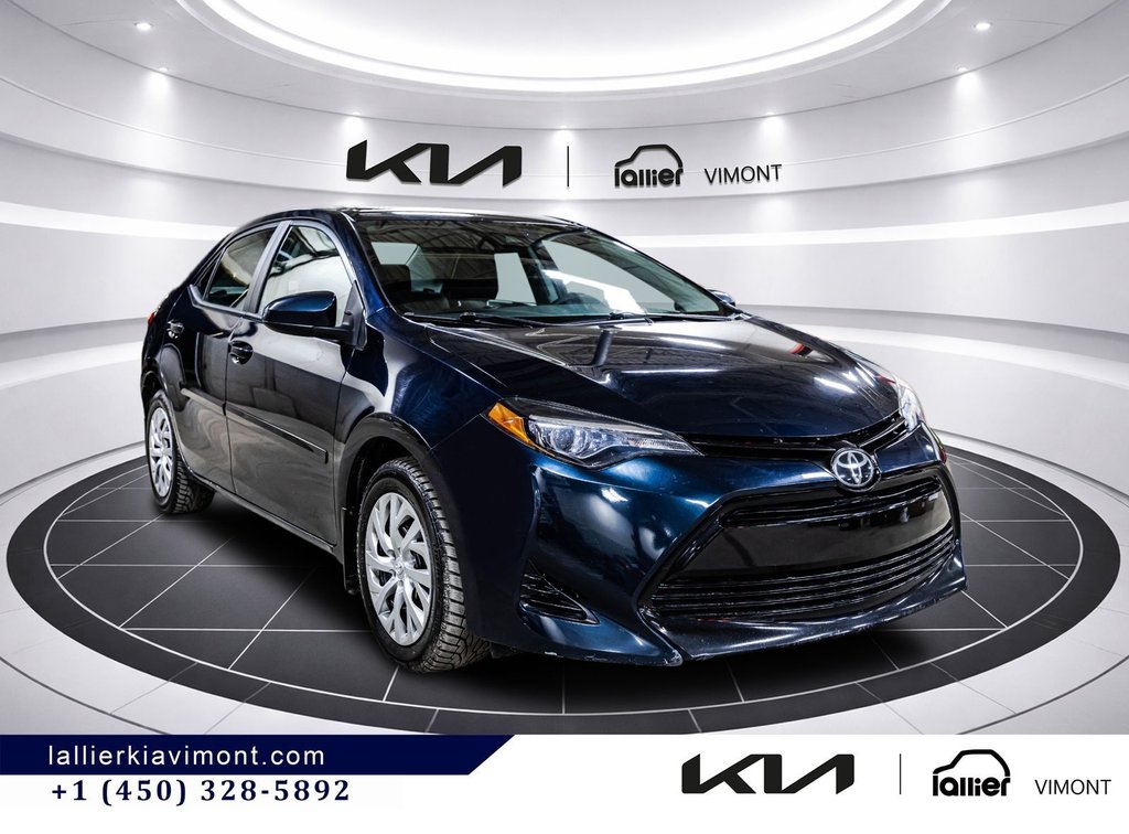 2018 Toyota Corolla LE in Montréal, Quebec - 17 - w1024h768px