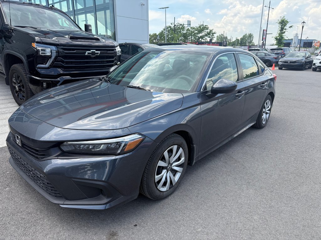 2023 Honda Civic Sedan LX in Montreal, Quebec - 1 - w1024h768px