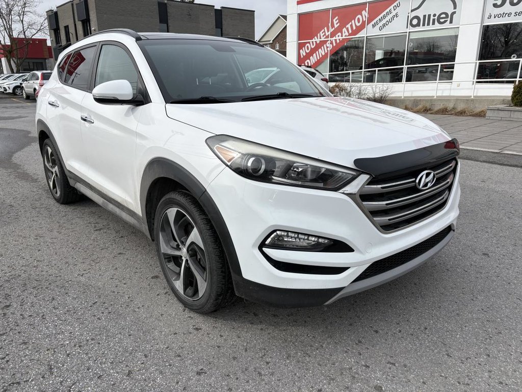 Hyundai Tucson SE 1,6 L 4 portes AWD I 1 PROPRIO I CUIR I SIEGES ET VOLANT CHAUFFANTS I TOIT PANORAMIQUE I CAMERA 2017 à Montréal, Québec - 2 - w1024h768px