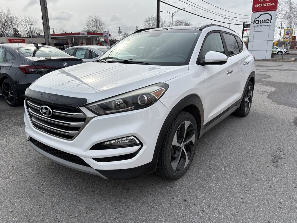 Hyundai Tucson SE 1,6 L 4 portes AWD I 1 PROPRIO I CUIR I SIEGES ET VOLANT CHAUFFANTS I TOIT PANORAMIQUE I CAMERA 2017 à Montréal, Québec - 3 - w1024h768px