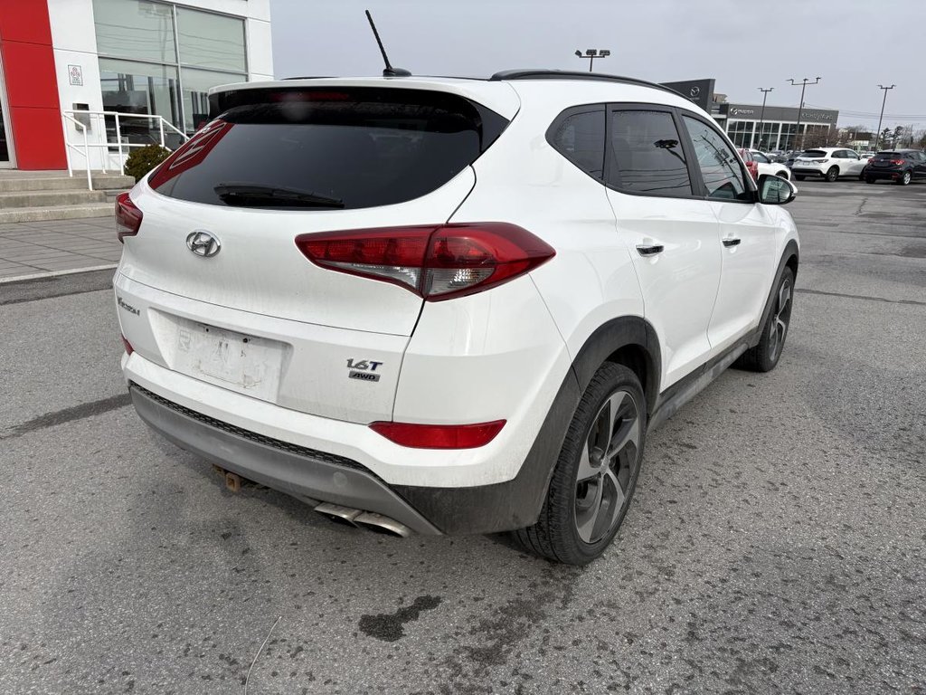 Hyundai Tucson SE 1,6 L 4 portes AWD I 1 PROPRIO I CUIR I SIEGES ET VOLANT CHAUFFANTS I TOIT PANORAMIQUE I CAMERA 2017 à Montréal, Québec - 5 - w1024h768px