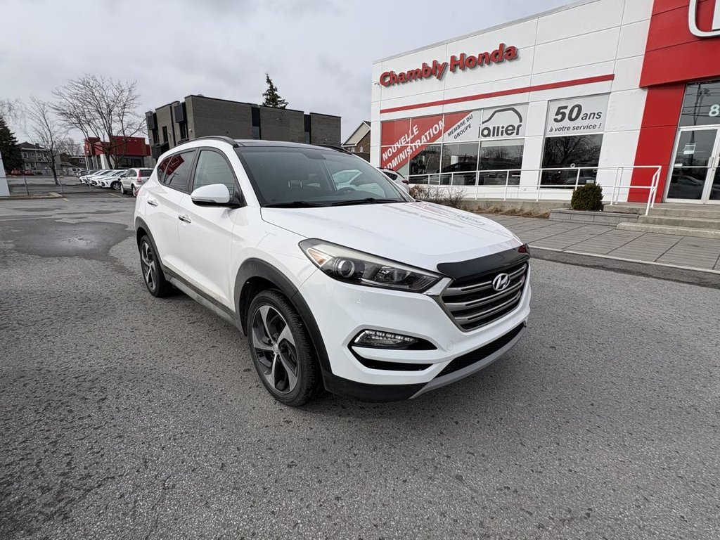 Hyundai Tucson SE 1,6 L 4 portes AWD I 1 PROPRIO I CUIR I SIEGES ET VOLANT CHAUFFANTS I TOIT PANORAMIQUE I CAMERA 2017 à Montréal, Québec - 1 - w1024h768px