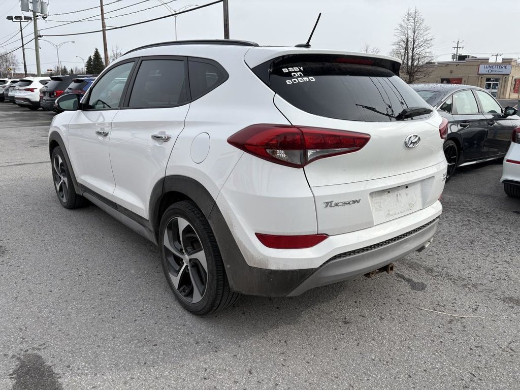 Hyundai Tucson SE 1,6 L 4 portes AWD I 1 PROPRIO I CUIR I SIEGES ET VOLANT CHAUFFANTS I TOIT PANORAMIQUE I CAMERA 2017 à Montréal, Québec - 4 - w1024h768px