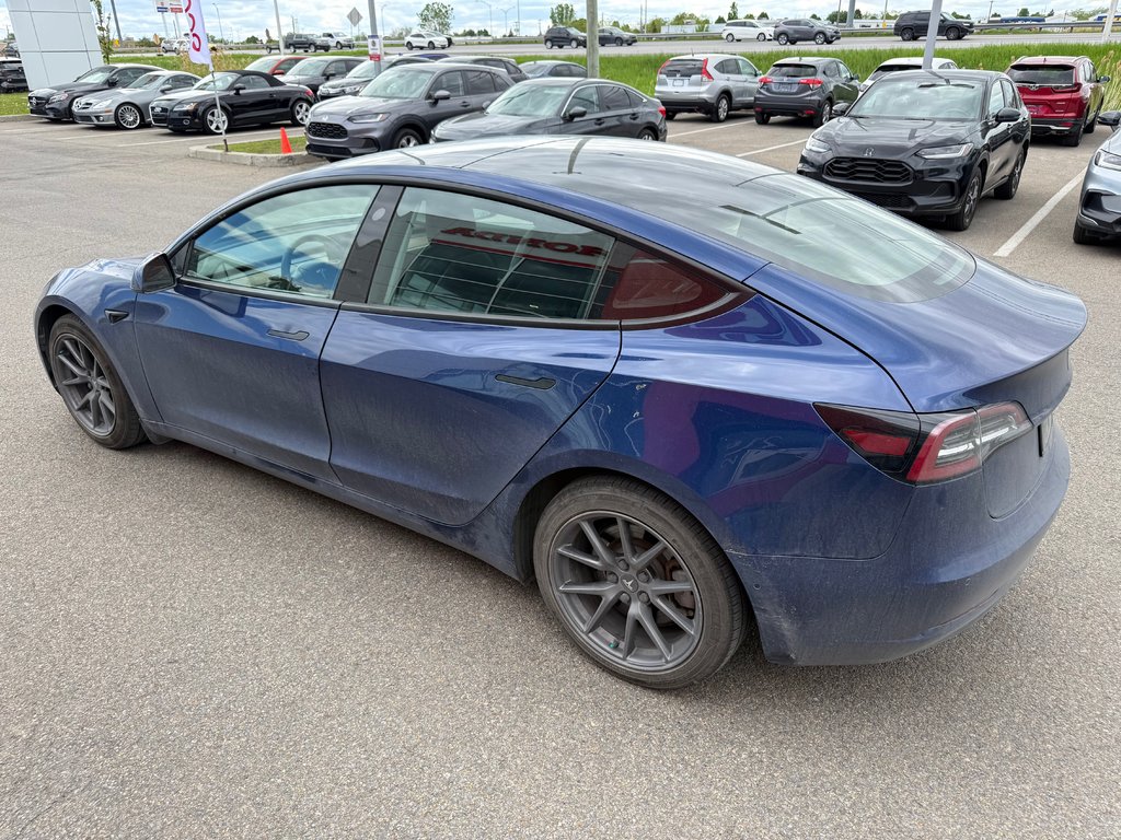 2021 Tesla Model 3 STANDARD RANGE PLUS in Lachenaie, Quebec - 3 - w1024h768px