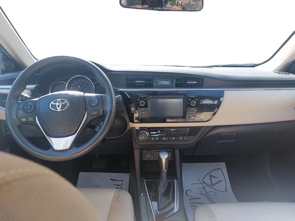 2014 Toyota Corolla in Jonquière, Quebec - 10 - w1024h768px