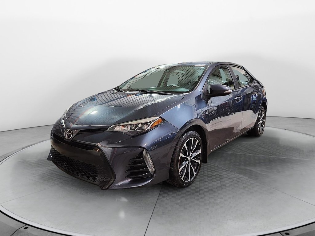 2019 Toyota Corolla in Baie-Comeau, Quebec - 1 - w1024h768px