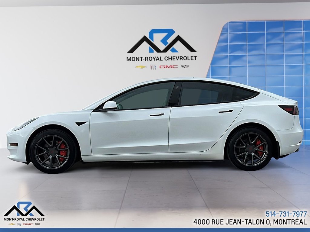 2023 Tesla Model 3 in Montreal, Quebec - 2 - w1024h768px
