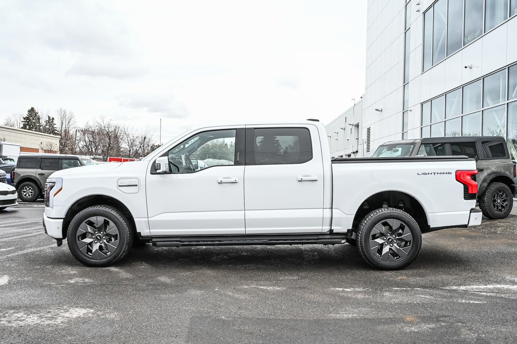 Ford F-150 Lightning LARIAT | EXTENDED RANGE 515KM | TOIT PANO | 2023 à Brossard, Québec - 8 - w1024h768px