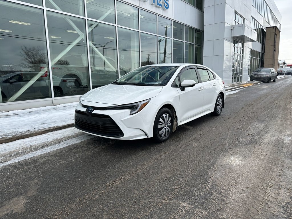 2025 Toyota Corolla Hybrid LE | BAS KM | SIÉGES CHAUFF | CARPLAY | in Brossard, Quebec - 1 - w1024h768px