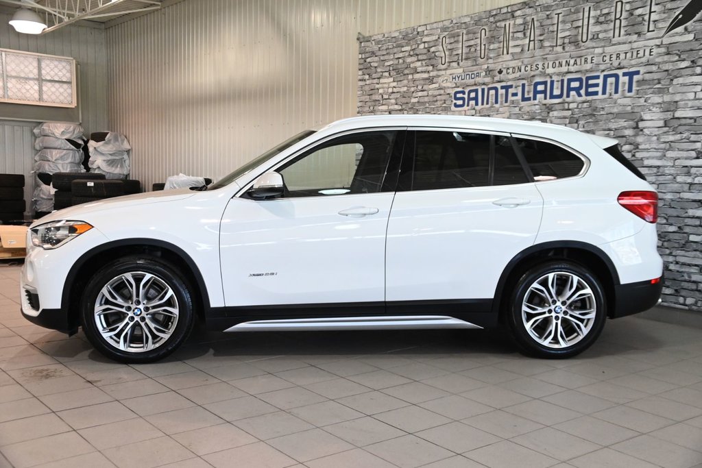 2017 BMW X1 XDRIVE28i TOIT PANORAMIQUE CUIR CAMERA in Montréal, Quebec - 7 - w1024h768px