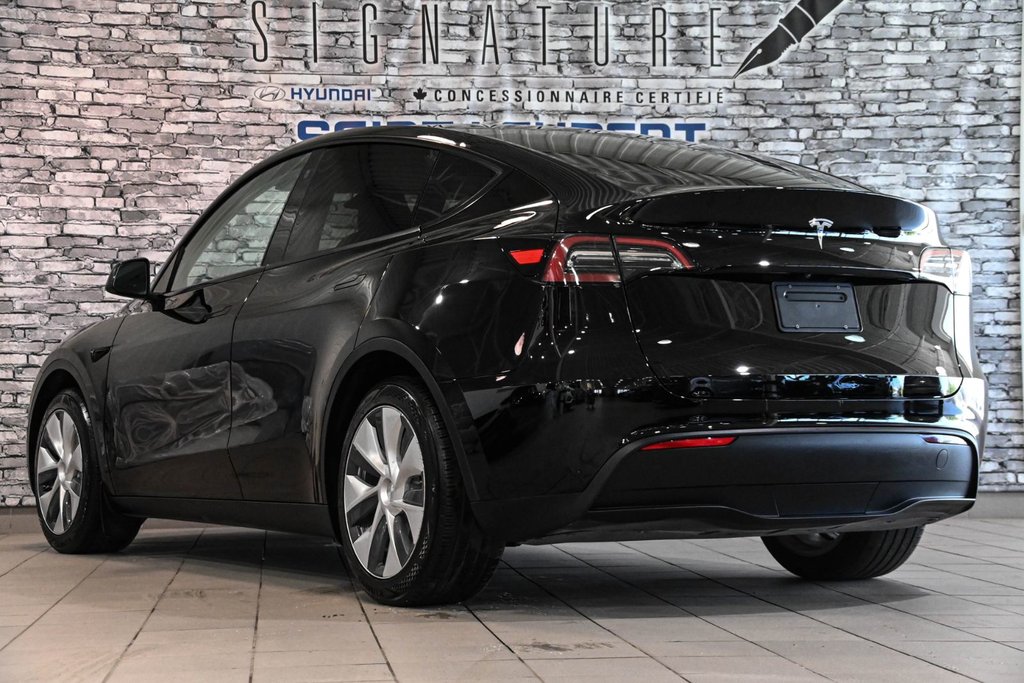 2023 Tesla Model Y STANDARD RANGE RWD CUIR TOIT PANO CAMERA in Montréal, Quebec - 11 - w1024h768px