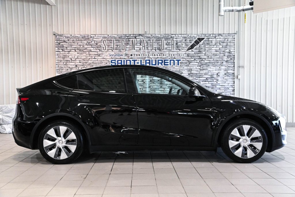 2023 Tesla Model Y STANDARD RANGE RWD CUIR TOIT PANO CAMERA in Montréal, Quebec - 14 - w1024h768px