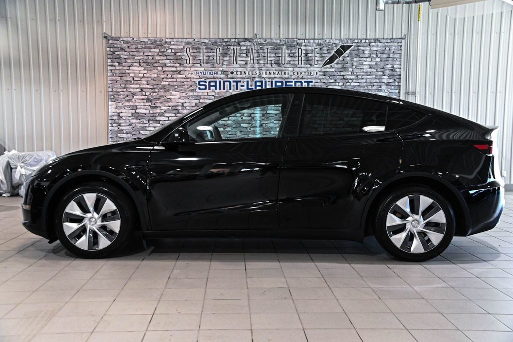 2023 Tesla Model Y STANDARD RANGE RWD CUIR TOIT PANO CAMERA in Montréal, Quebec - 15 - w1024h768px