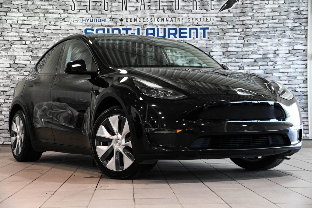 2023 Tesla Model Y STANDARD RANGE RWD CUIR TOIT PANO CAMERA in Montréal, Quebec - 5 - w1024h768px