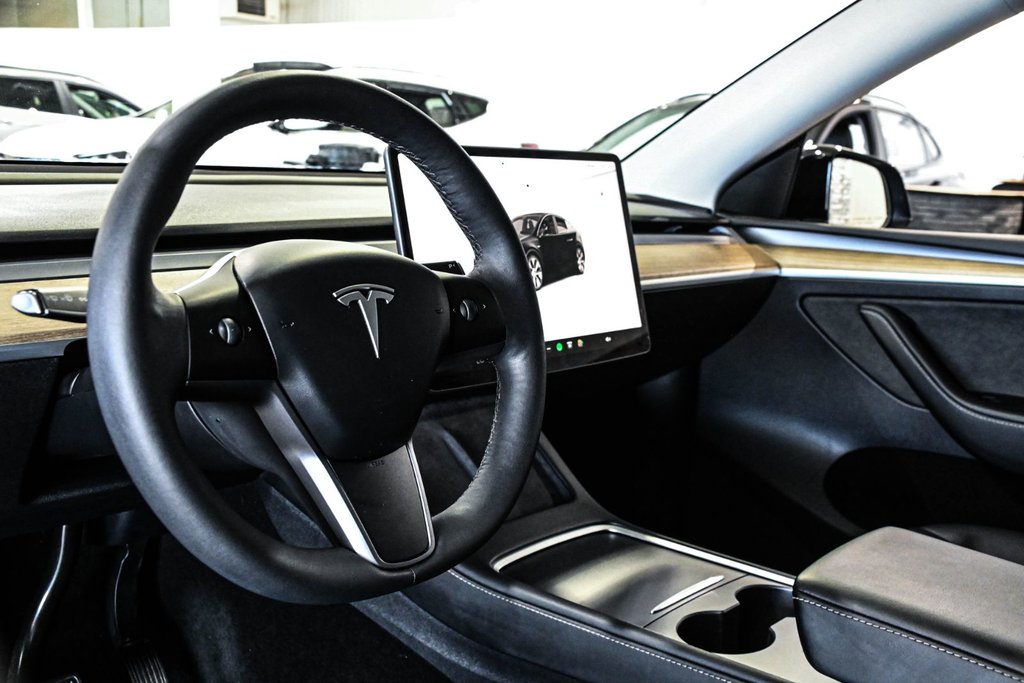 2023 Tesla Model Y STANDARD RANGE RWD CUIR TOIT PANO CAMERA in Montréal, Quebec - 17 - w1024h768px