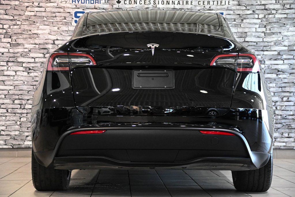 2023 Tesla Model Y STANDARD RANGE RWD CUIR TOIT PANO CAMERA in Montréal, Quebec - 9 - w1024h768px
