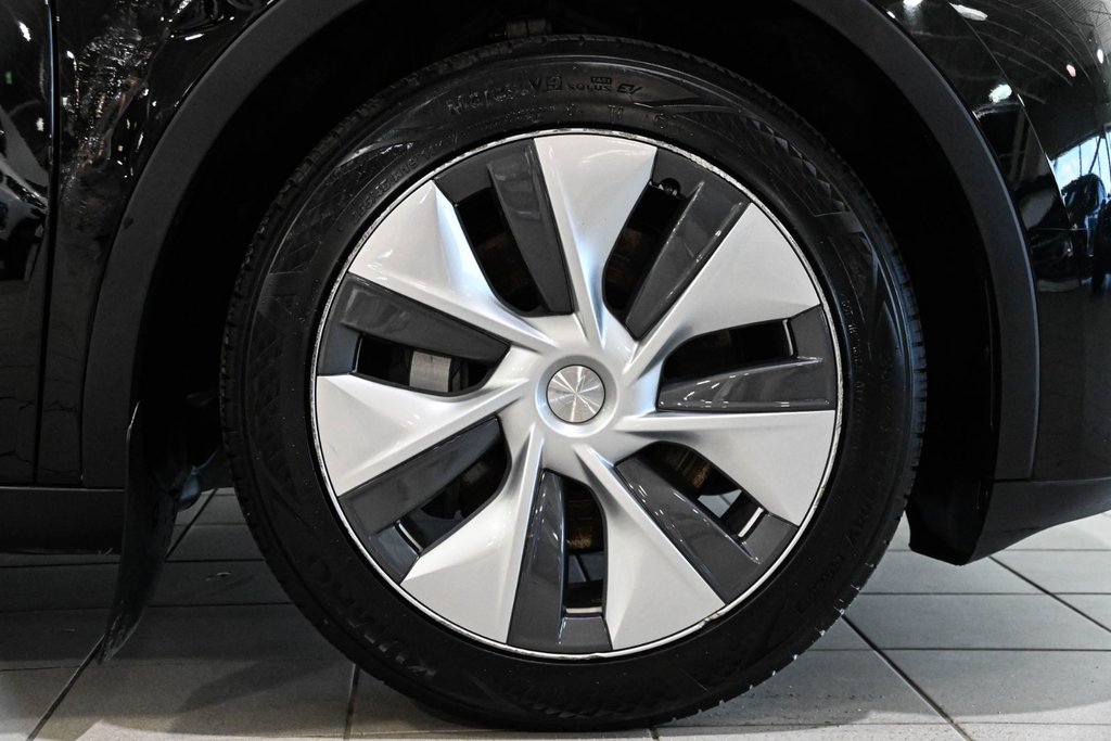 2023 Tesla Model Y STANDARD RANGE RWD CUIR TOIT PANO CAMERA in Montréal, Quebec - 16 - w1024h768px