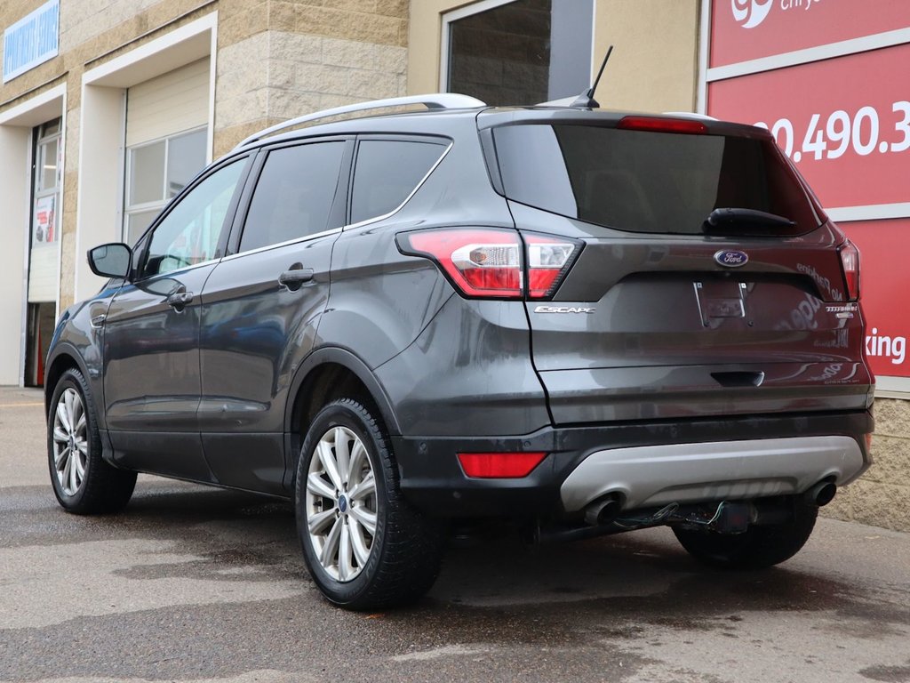 2018 Ford Escape TITANIUM IN GREY EQUIPPED WITH A 2.0L TURBO I4 , 4WD , 6SPD AUTO ,  LEATHER , PANO ROOF, NAV, REMOTE START , PREMIUM AUDIO , DUA-5