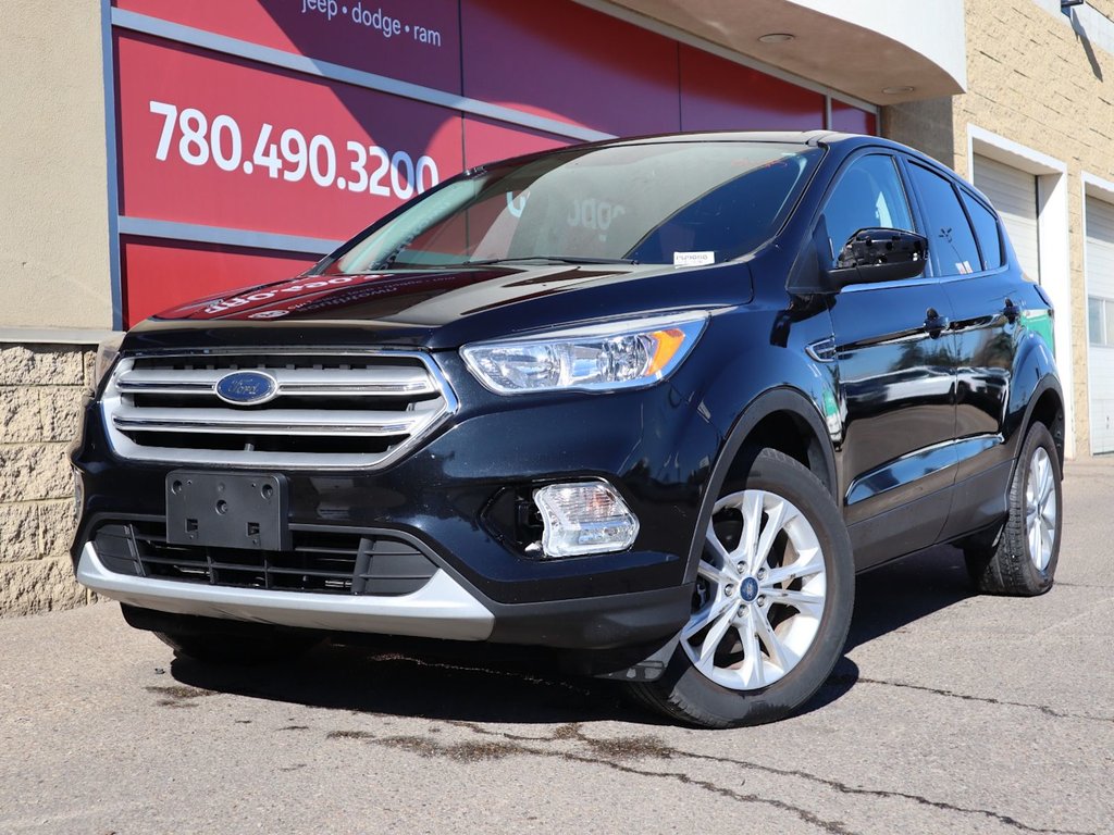 2019 Ford Escape SE IN BLACK EQUIPPED WITH A FUEL EFFICIENT 1.5L TURBO I4 , 4X4 , 6SPD AUTO , HEATED CLOTH BUCKET SEATS , AC , CRUISE , BACKUP CA-0