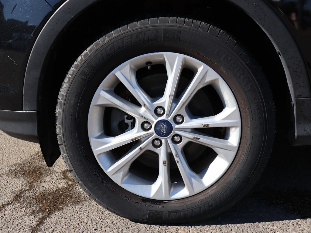 2019 Ford Escape SE IN BLACK EQUIPPED WITH A FUEL EFFICIENT 1.5L TURBO I4 , 4X4 , 6SPD AUTO , HEATED CLOTH BUCKET SEATS , AC , CRUISE , BACKUP CA-4