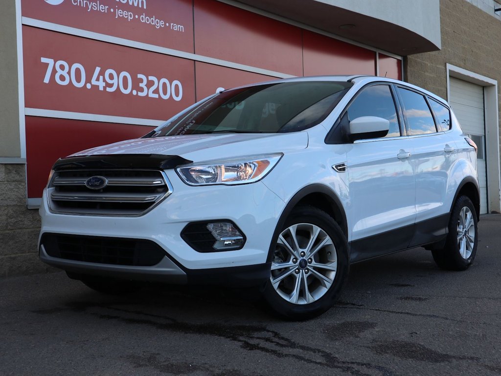 2019 Ford Escape SE IN WHITE EQUIPPED WITH A 1.5L TURBO I4 , 4X4 , 6SPD AUTO , CLOTH HEATED SEATS , DUAL ZONE AC , CRUISE , BACKUP CAM , SW CONTR-0