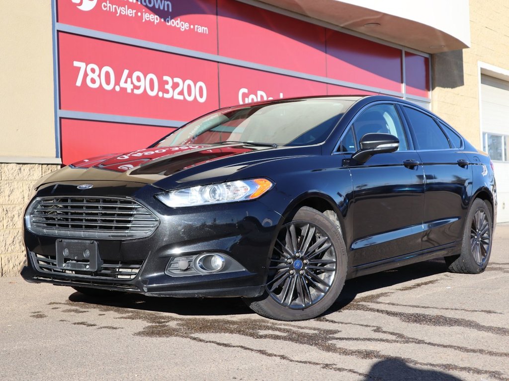 2014 Ford Fusion SE IN BLACK EQUIPPED WITH A 2.0L ECOBOOST I4 , AWD , 6SPD AUTO , LEATHER HEATED SEATS , BLUETOOTH , SW CONTROLS , SUNROOF , 18IN-0