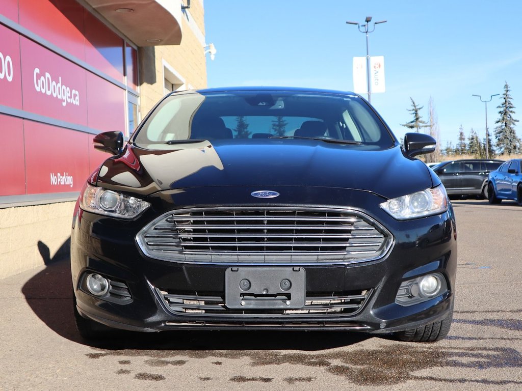 2014 Ford Fusion SE IN BLACK EQUIPPED WITH A 2.0L ECOBOOST I4 , AWD , 6SPD AUTO , LEATHER HEATED SEATS , BLUETOOTH , SW CONTROLS , SUNROOF , 18IN-1
