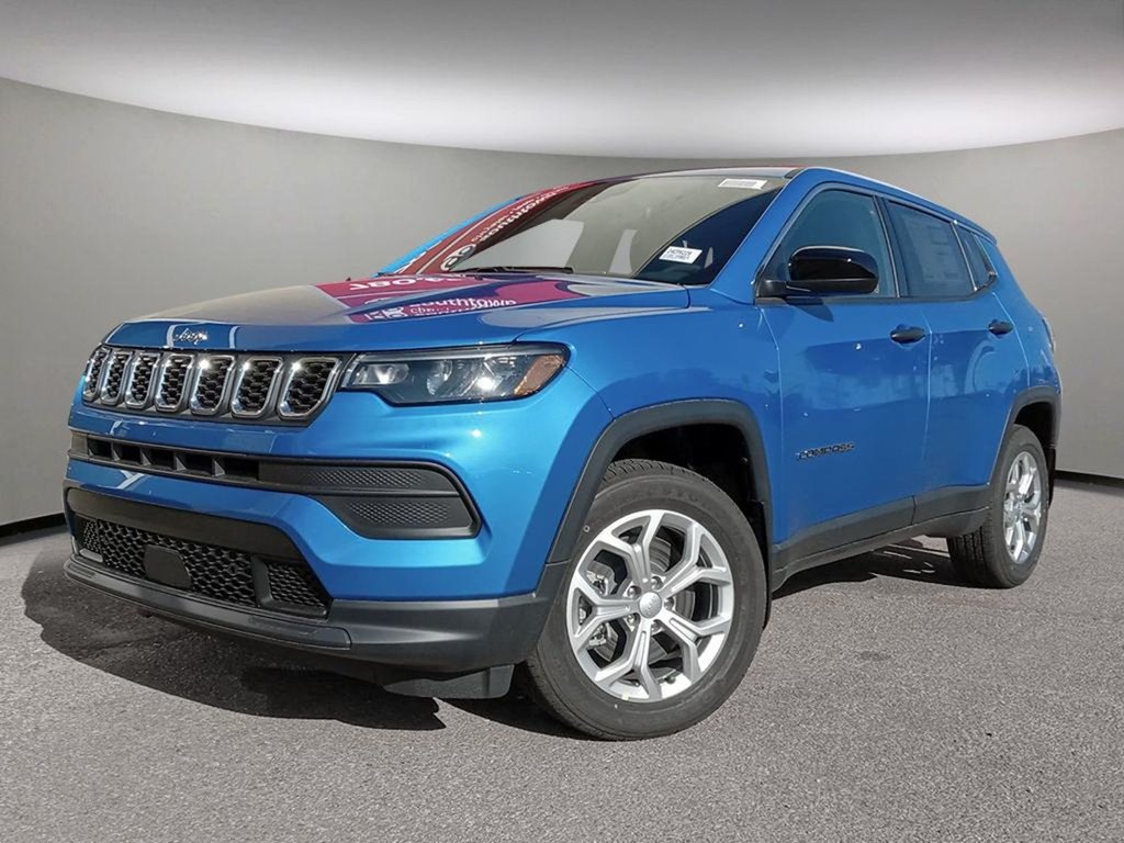 2024 Jeep Compass SPORT IN LASER BLUE PEARL EQUIPPED WITH A 2.0L TURBO I4 , 4X4 , 8SPD AUTO , 10.1INCH TOUCHSCREEN , AC , CRUISE , HEATED SEATS +-0