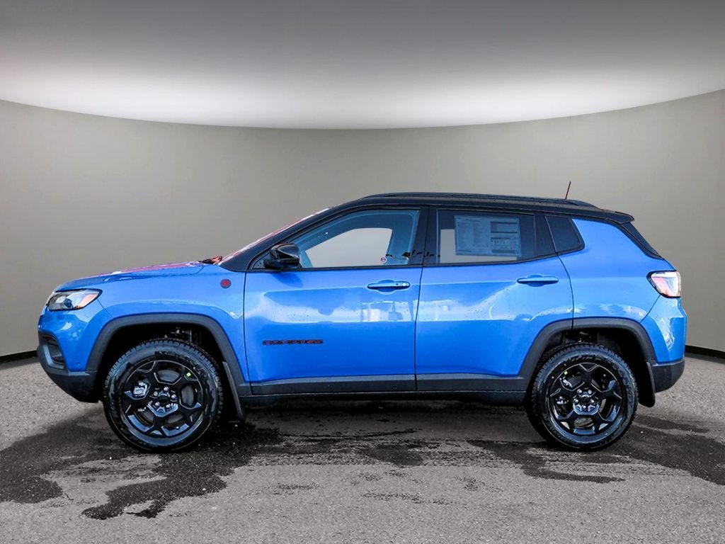 2024 Jeep Compass TRAILHAWK IN LASER BLUE PEARL EQUIPPED WITH A 2.0L TURBO I4 , 4X4 , 8SPD AUTO , DRIVER ASSIST GROUP I , SUN SOUND & NAV GROUP ,-2
