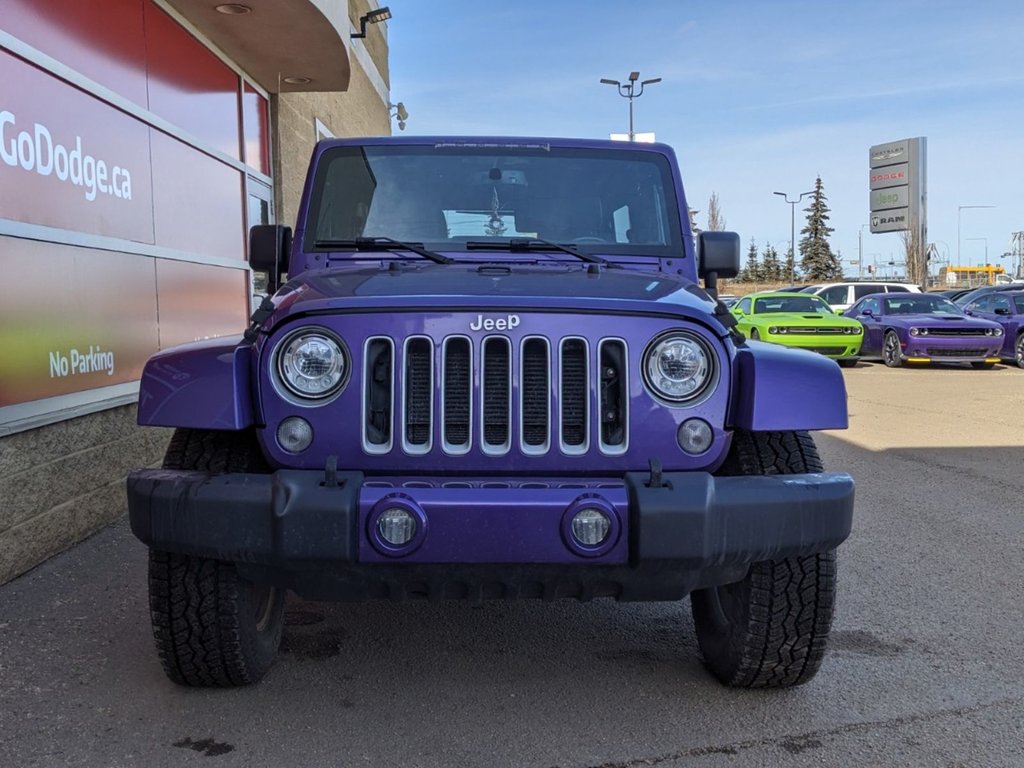 2018 Jeep WRANGLER JK UNLIMITED UNLIMITED SAHARA IN XTREME PURPLE PEARL EQUIPPED WITH A 3.6L V6 , 4X4 , 5SPD AUTO , NAV , 18INCH RIMS , REMOTE START , HARDTOP ,-1
