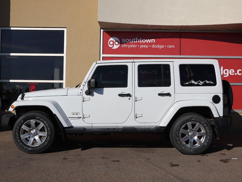 2018 Jeep WRANGLER JK UNLIMITED UNLIMITED SAHARA IN BRIGHT WHITE EQUIPPED WITH A 3.6L V6 , 4X4 , 5SPD AUTO , 18INCH RIMS , REMOTE START , NAV , ANTI SPIN DIFF ,-6